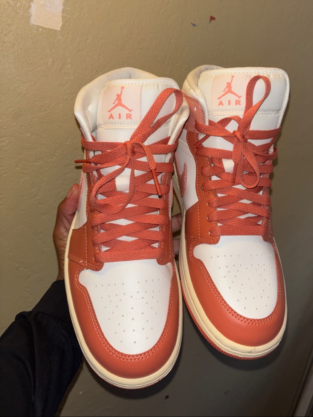 Jordan 1 Mid Sneakers in White and Pink